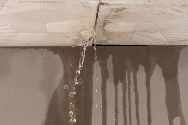 Professional Flood Damage Cleanup technician working in Pompton Lakes, NJ